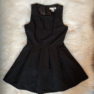 Black w/ white dots, mini, A-line dress.